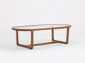 Tavolino da caffè 125×60×43 cm - legno marrone e vetro trasparente - profilo ovale con struttura curva per soggiorno